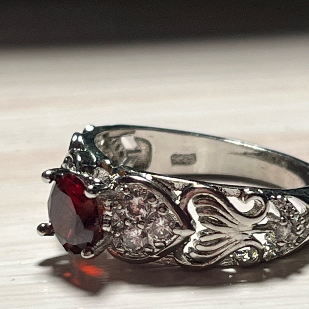 Silver ring with red stone size 9-10